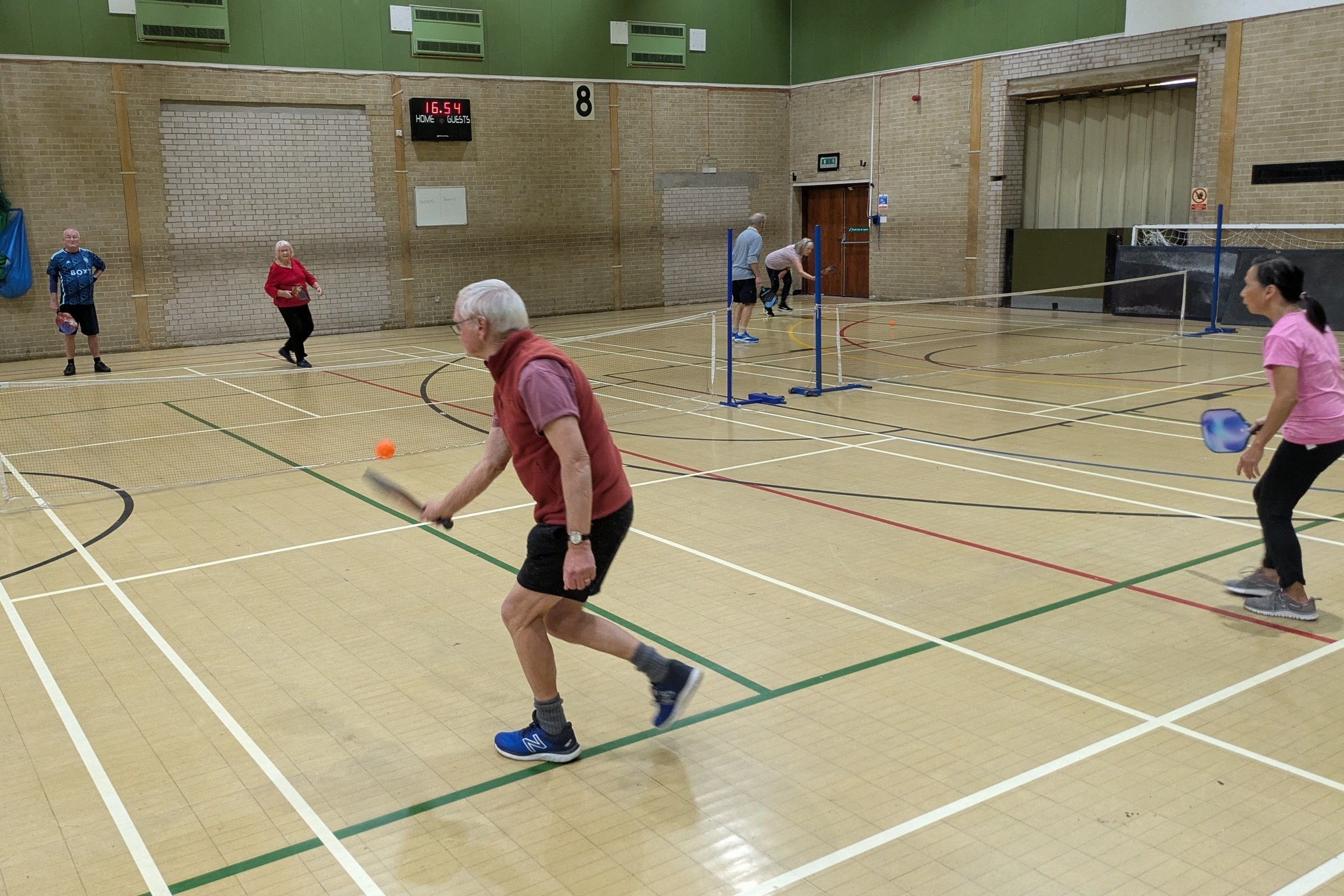 Group playing Pickleball