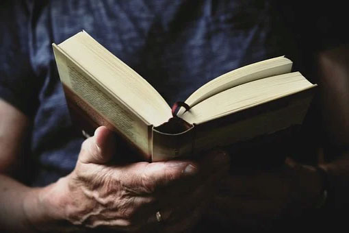 A book of poetry being read